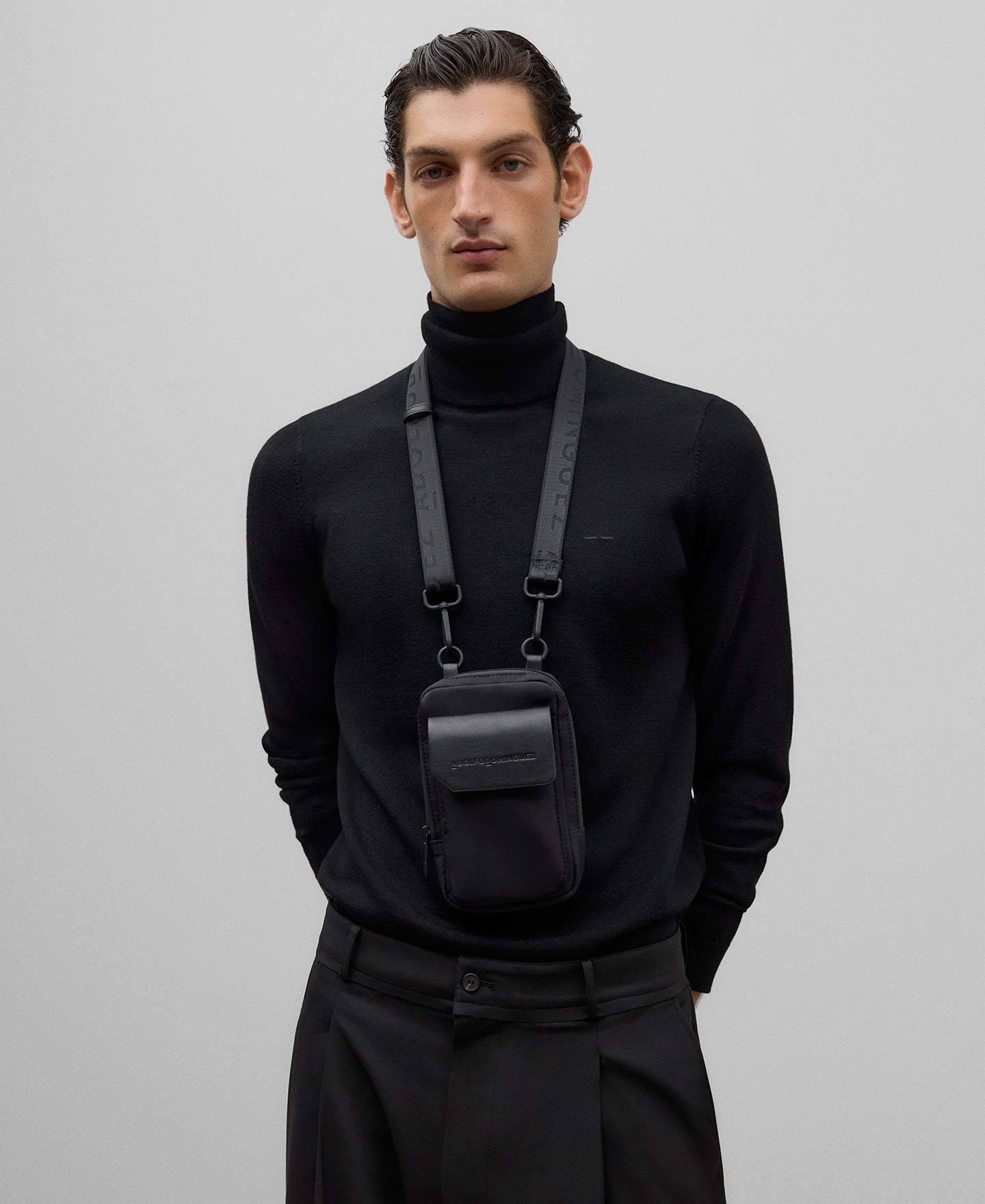 Black flap mobile phone holder man in black