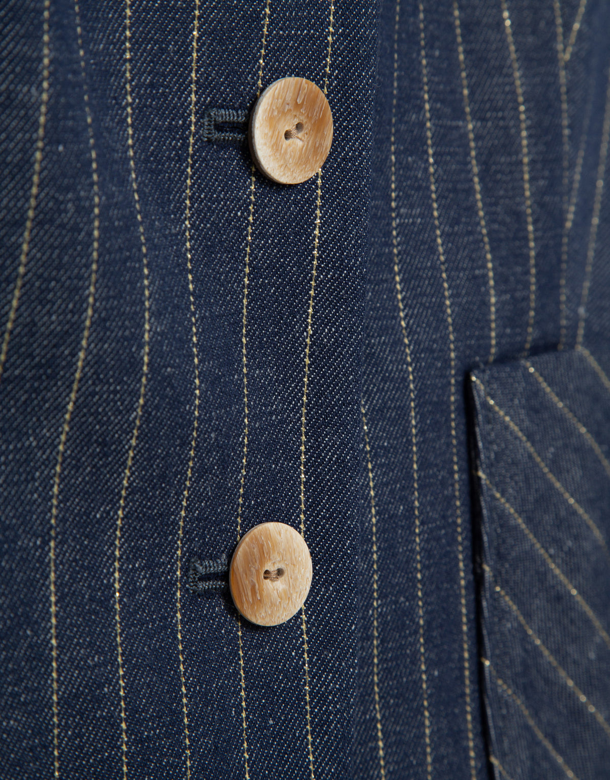 Blue denim and linen vest with gold outlines