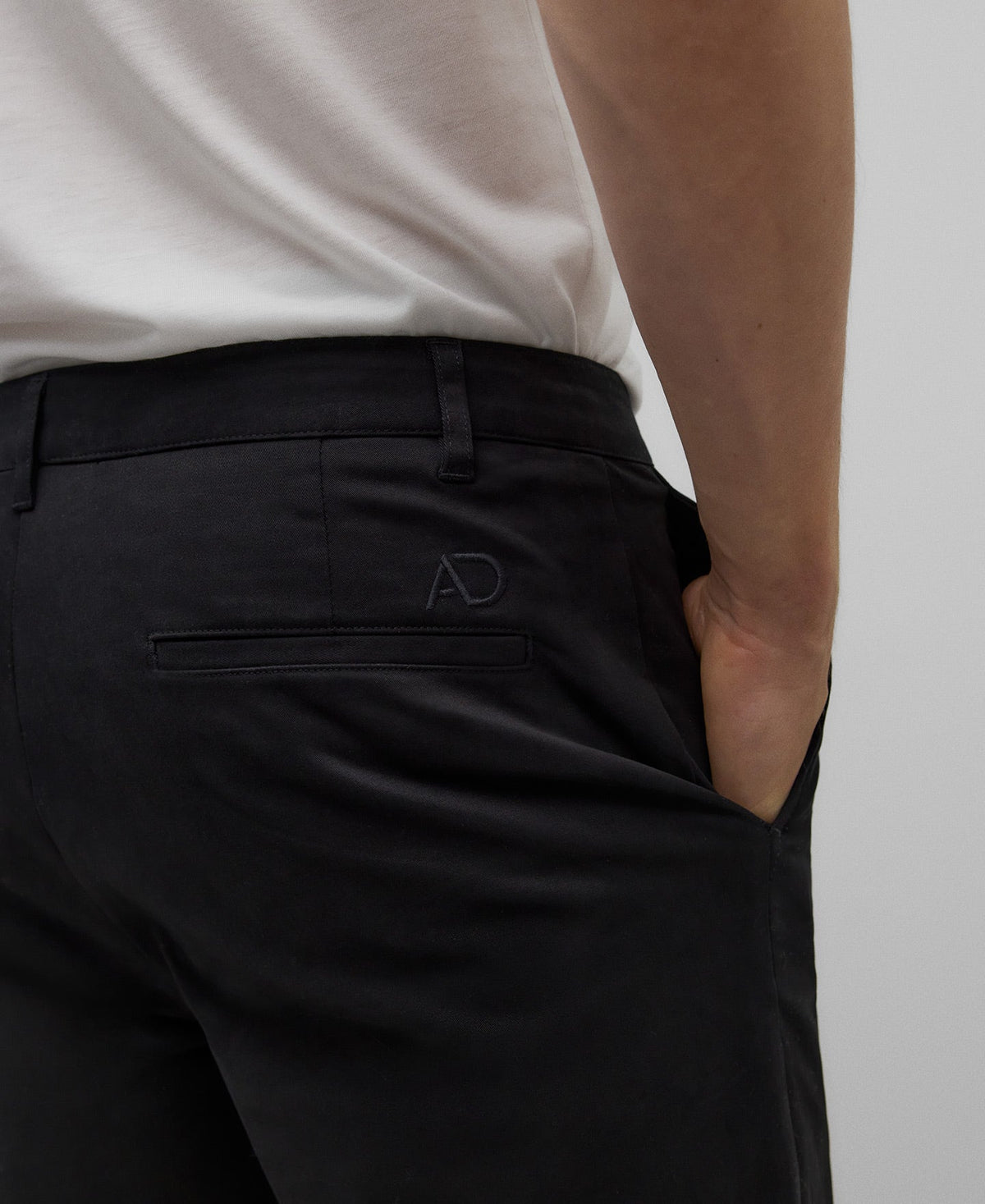 Slim fit cotton chino trousers man in black