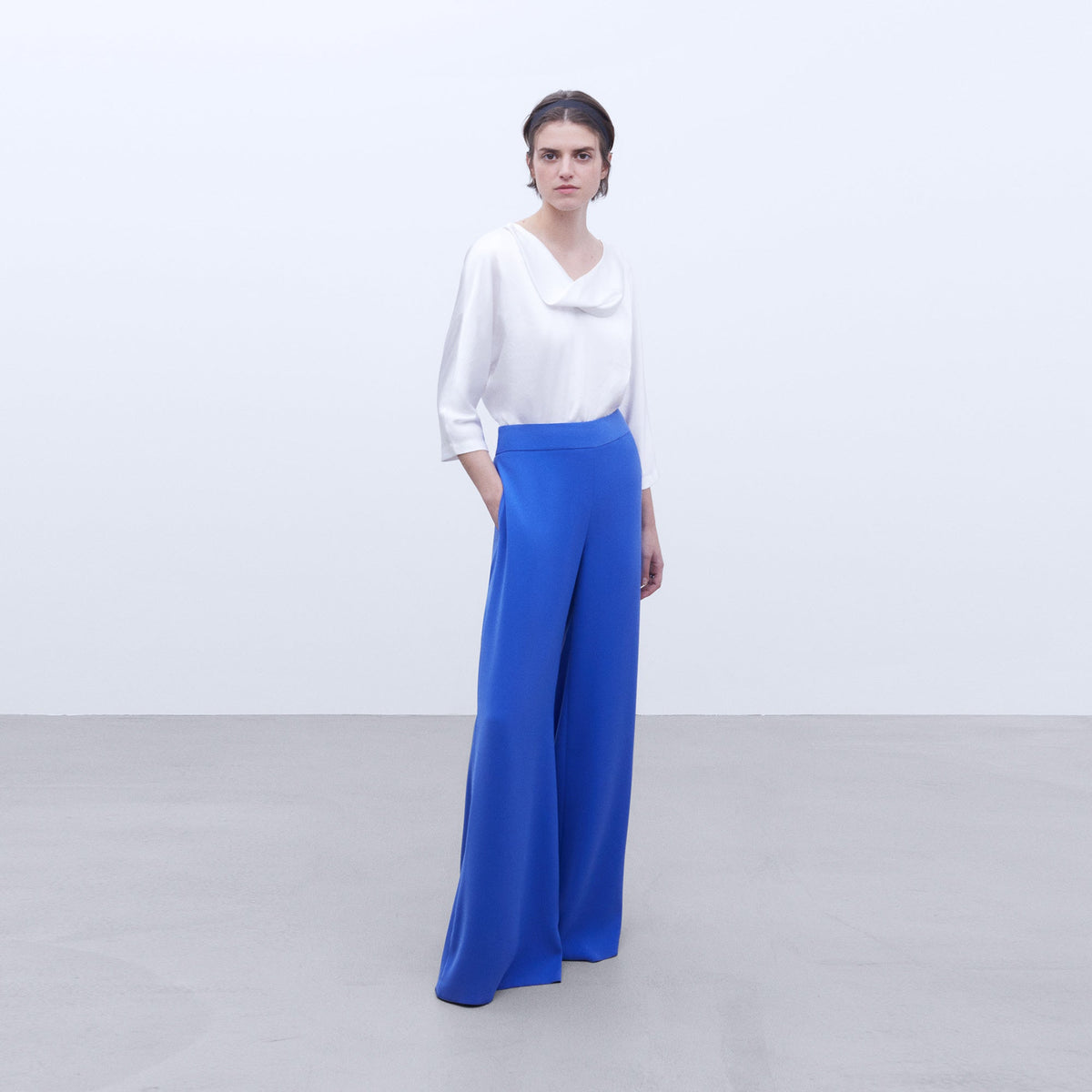 Elegant White Batwing Top
