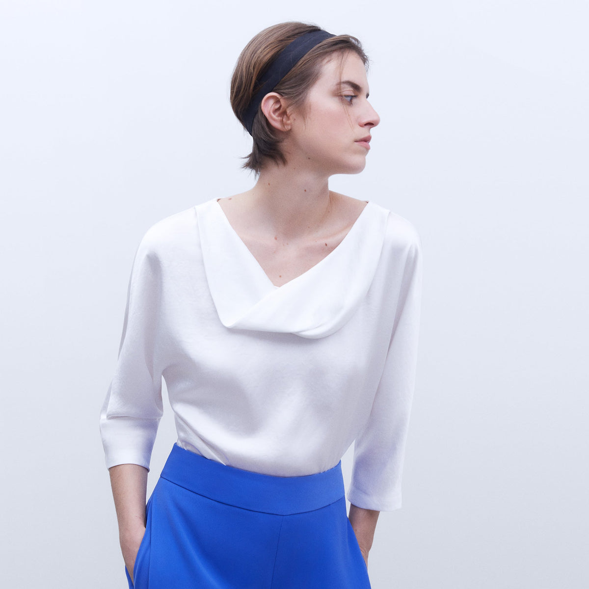 Elegant White Batwing Top
