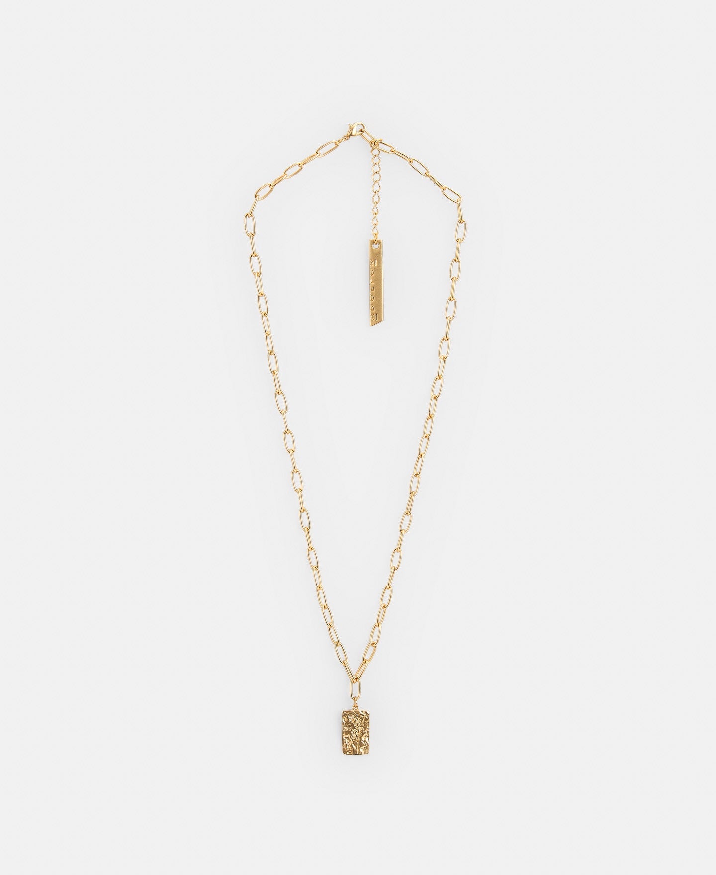Gold Metal Pendant With Pressed Motif