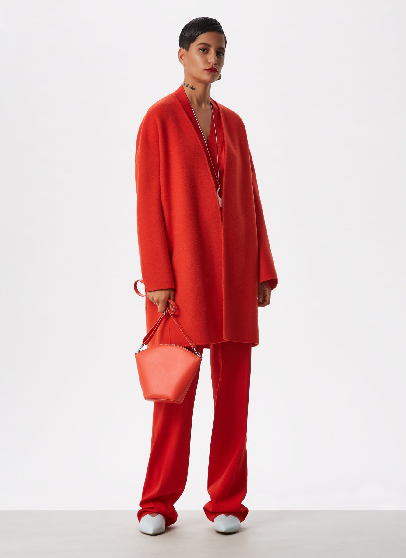 Orange Vachetta Leather Clutch With Long Strap