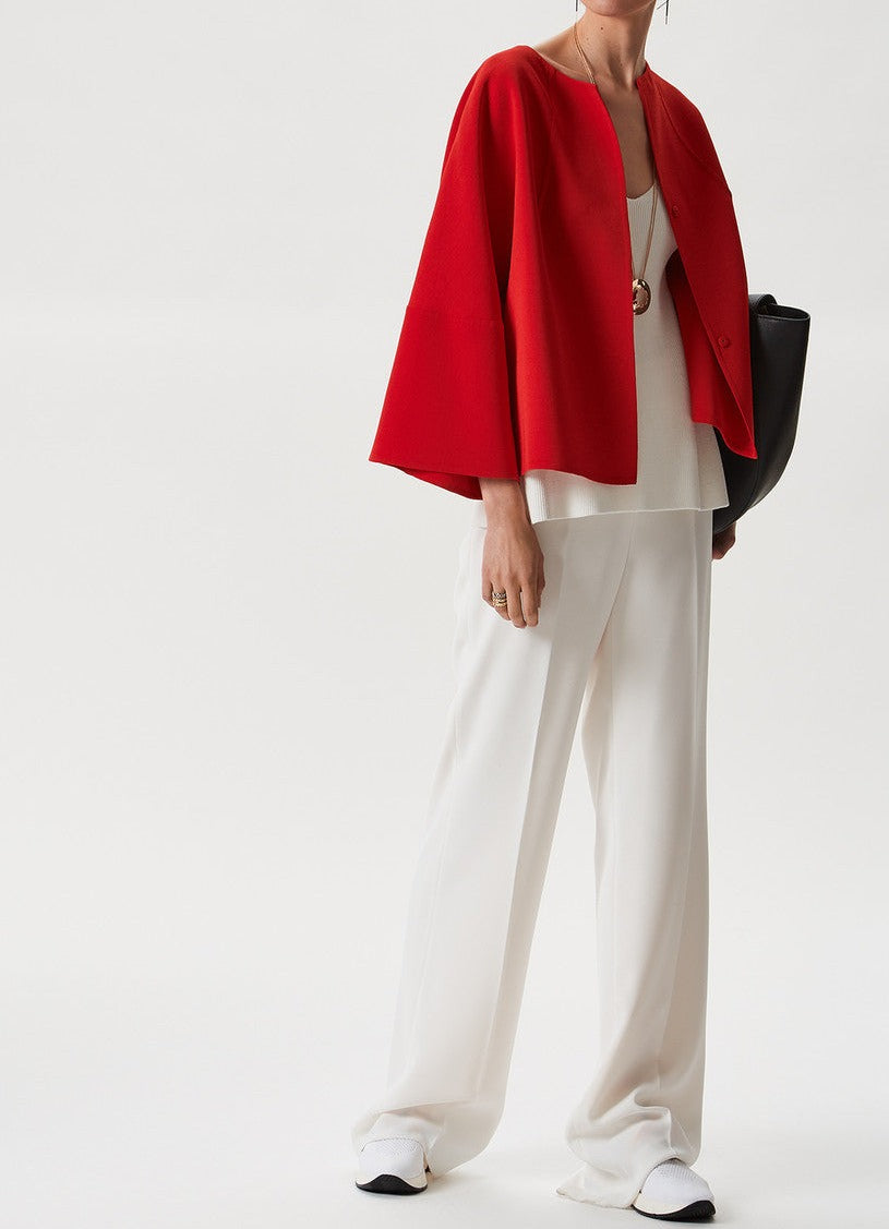 Ecru Knit Peplum Top With Open Back