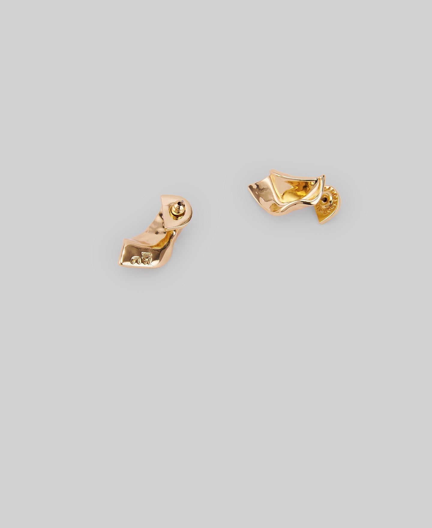 Gold leaf earrings woman in gold