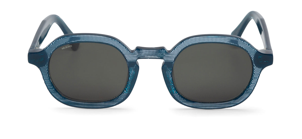 A pair of blue-framed oval sunglasses with dark lenses.