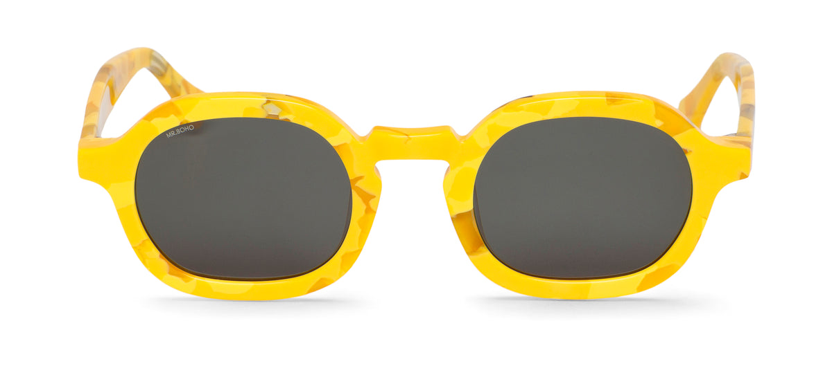 A pair of yellow-framed oval sunglasses with dark lenses.