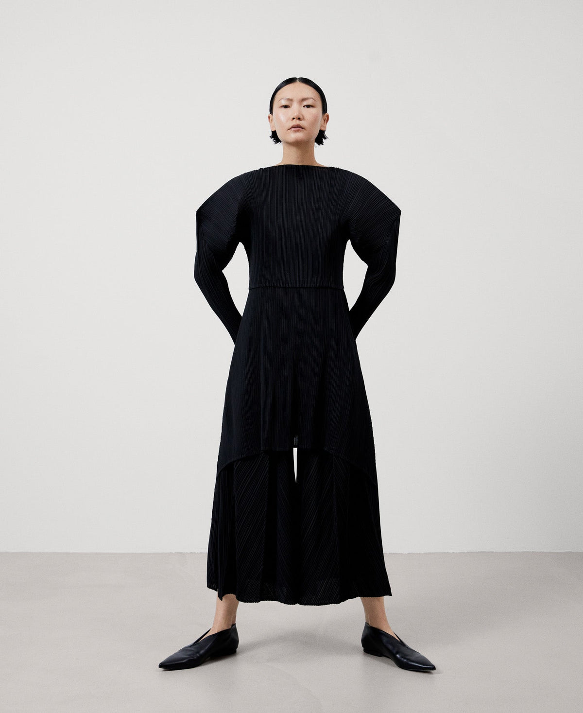 Women Trousers | Black Loose Crinkle Trousers by Spanish designer Adolfo Dominguez