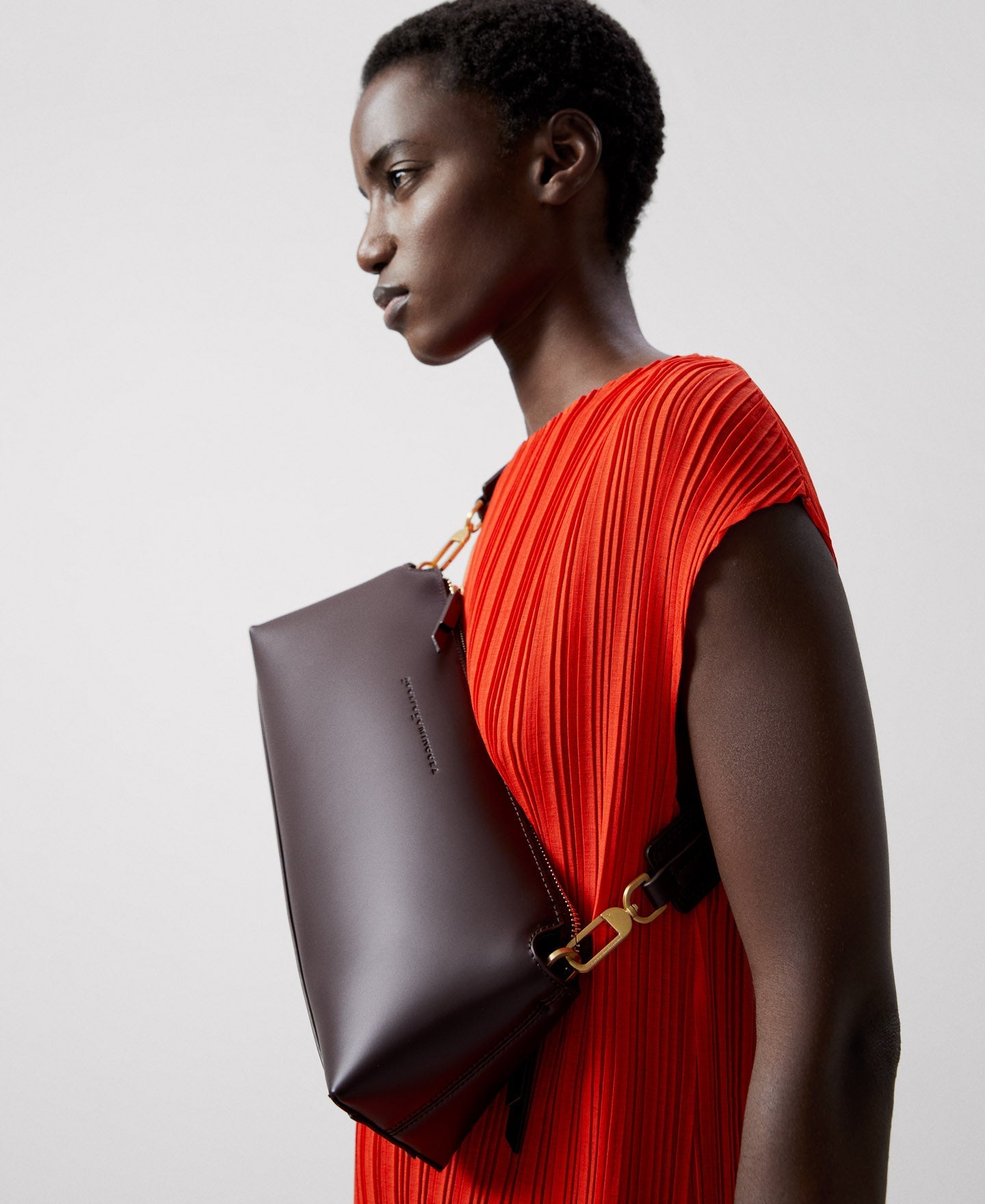 Women Bags | Chocolate Recycled Material Baguette Bag by Spanish designer Adolfo Dominguez