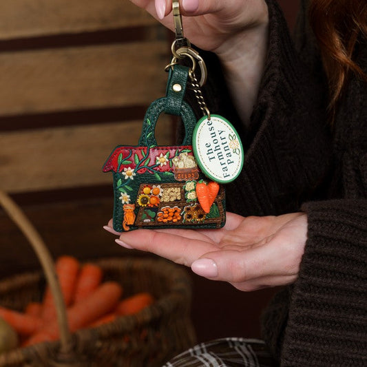 Vendula London The Farmhouse Pantry Key Charm held by model
