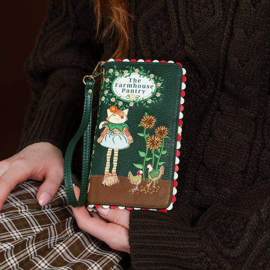 Vendula London The Farmhouse Pantry Universal Flip Phone Case held by model