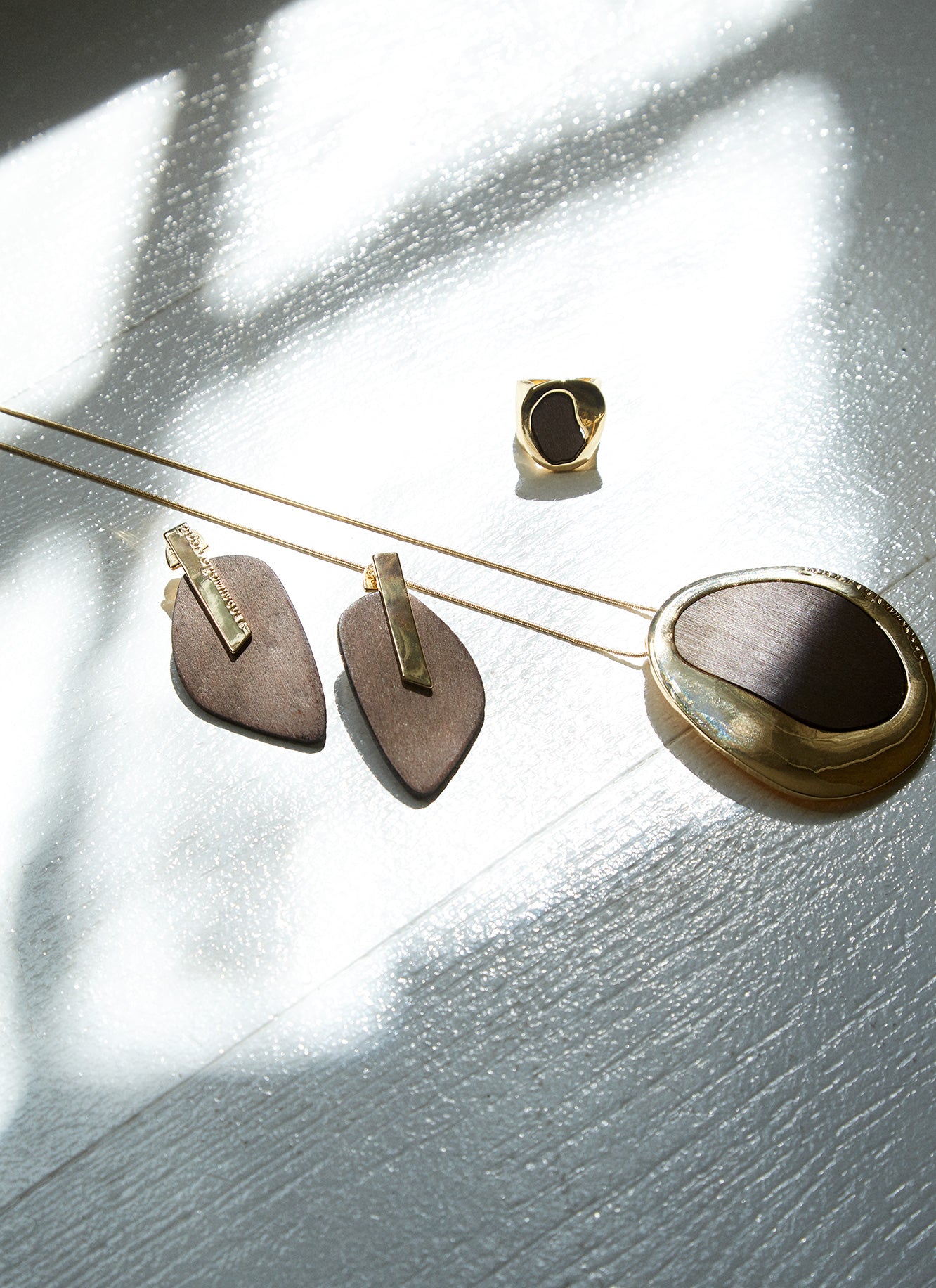 Women Necklace | Gold Long Necklace With Wood Pendant by Spanish designer Adolfo Dominguez
