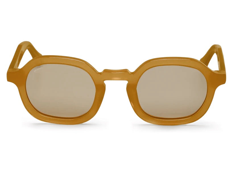 A pair of tan framed oval sunglasses with tinted lenses.