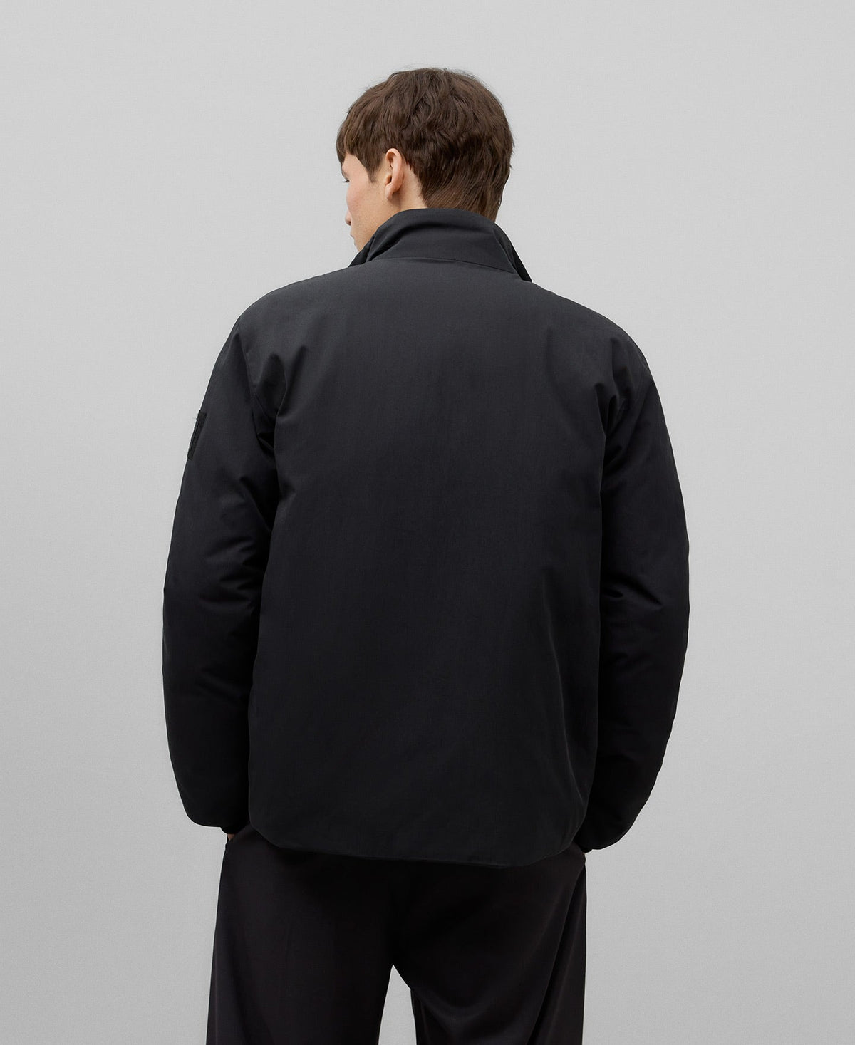 Short padded jacket man in black