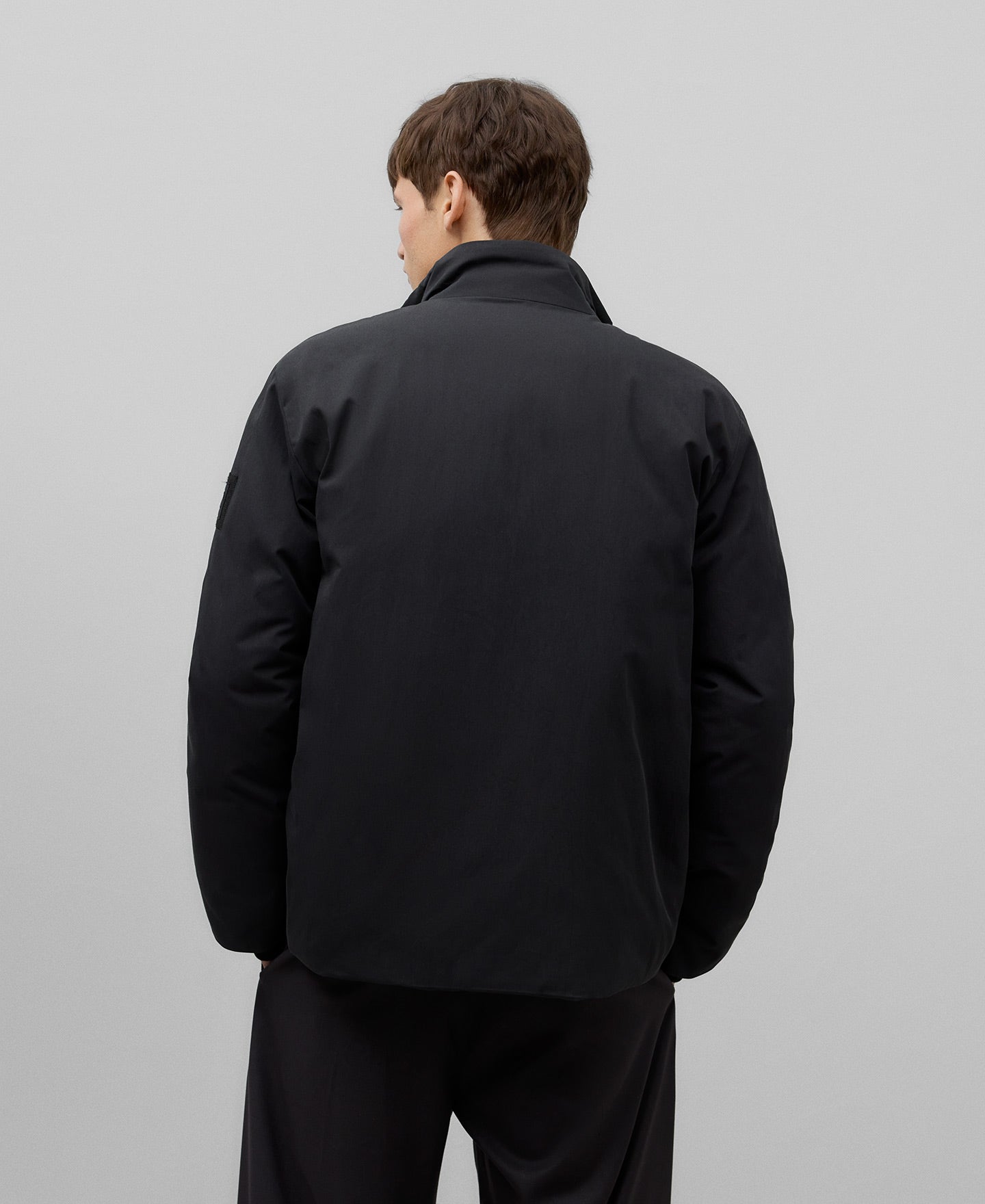 Short padded jacket man in black