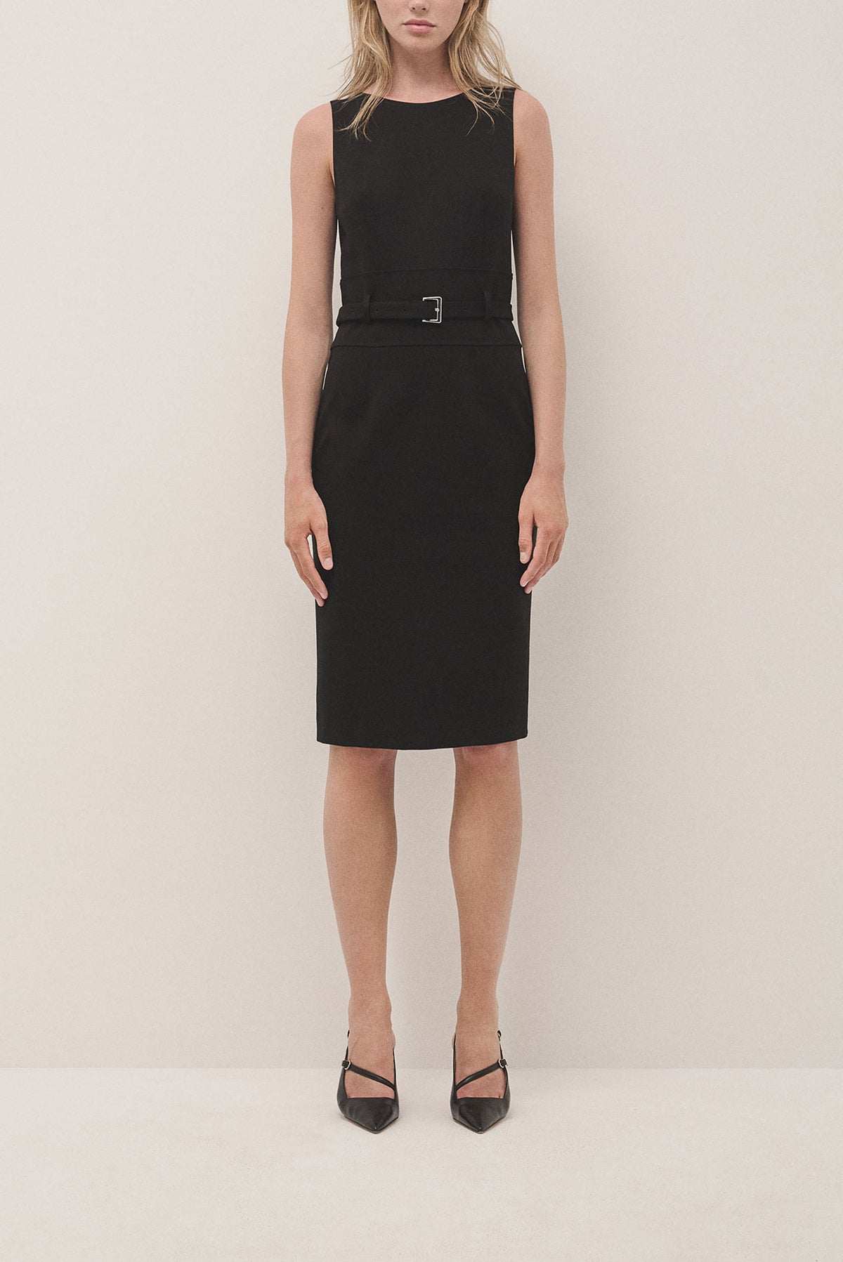 Black sleeveless dress with belt in cut knitted fabric