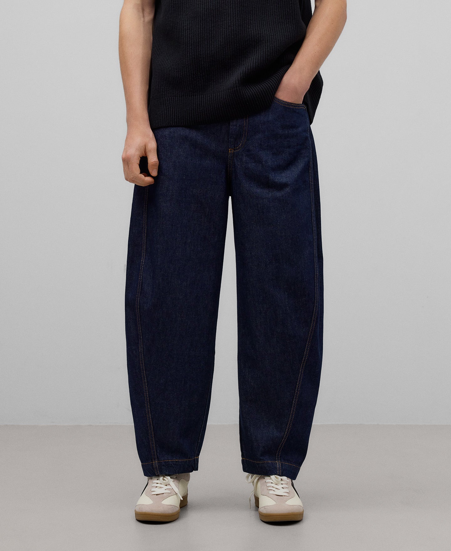 Blue barrel fit denim trousers man in navy blue