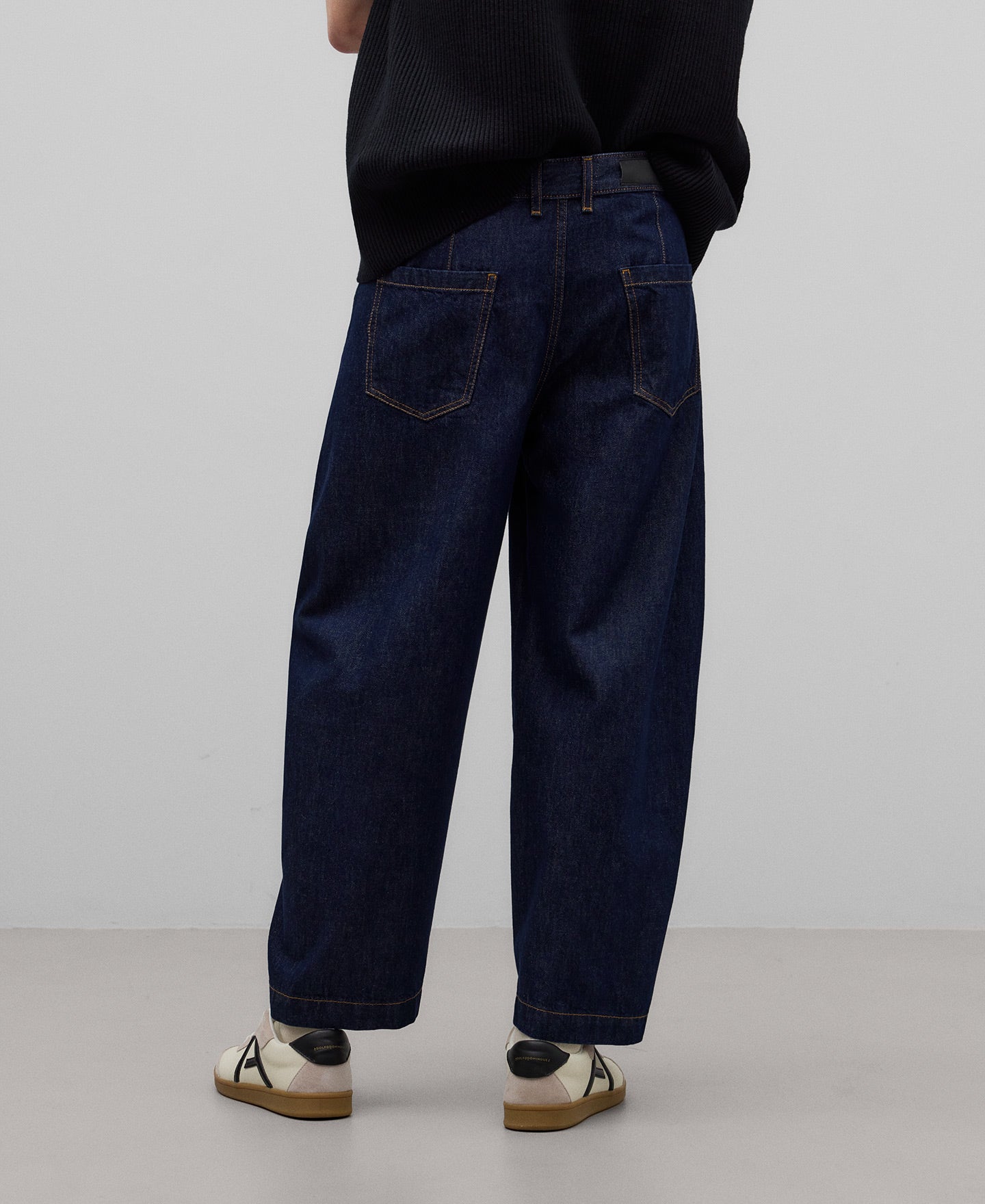 Blue barrel fit denim trousers man in navy blue
