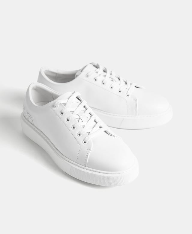 White Sneakers With Die-Cut Logo
