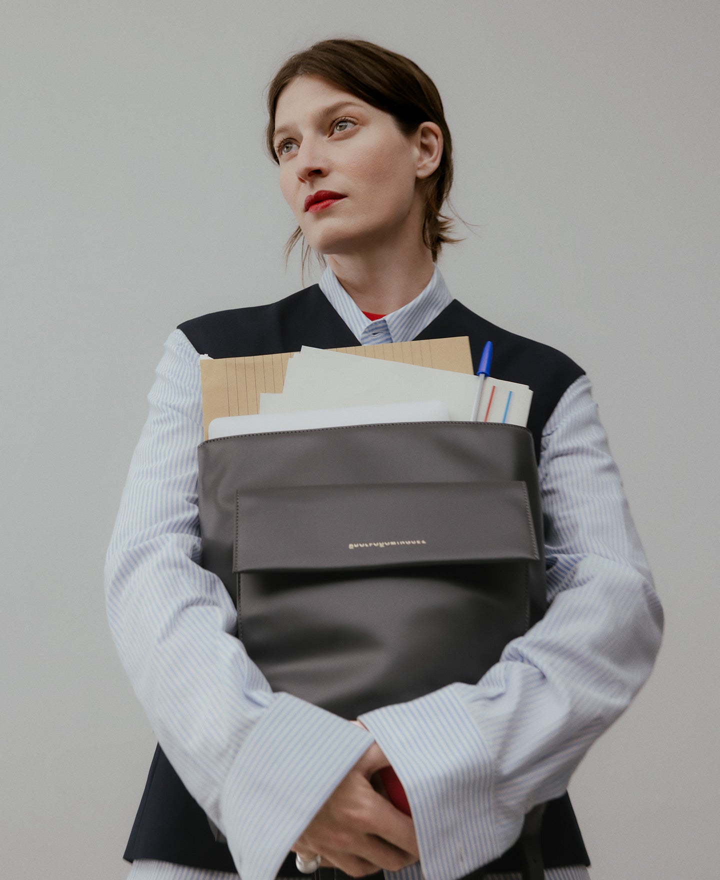 Woman holding a handbag