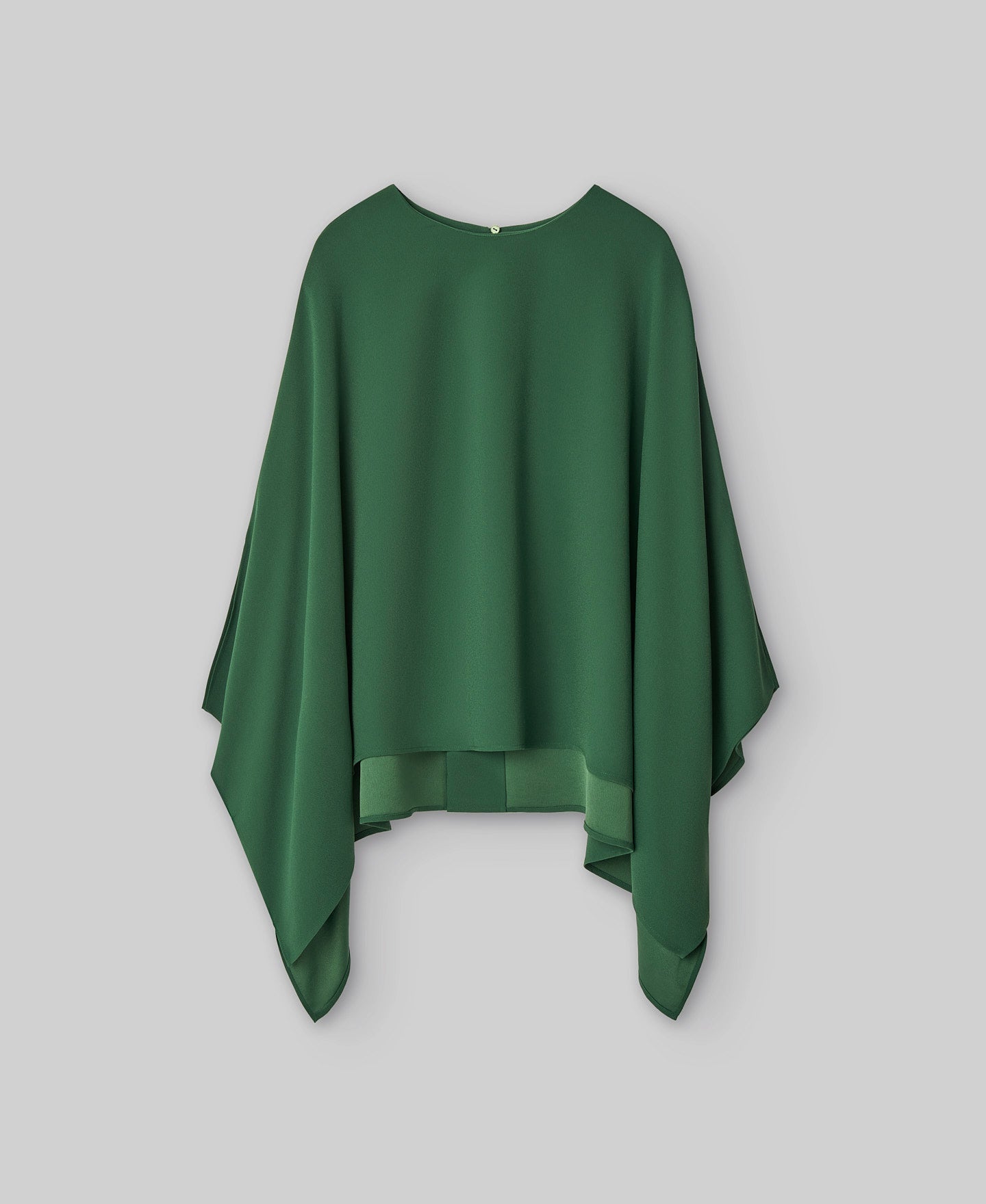 Wide green top woman in green