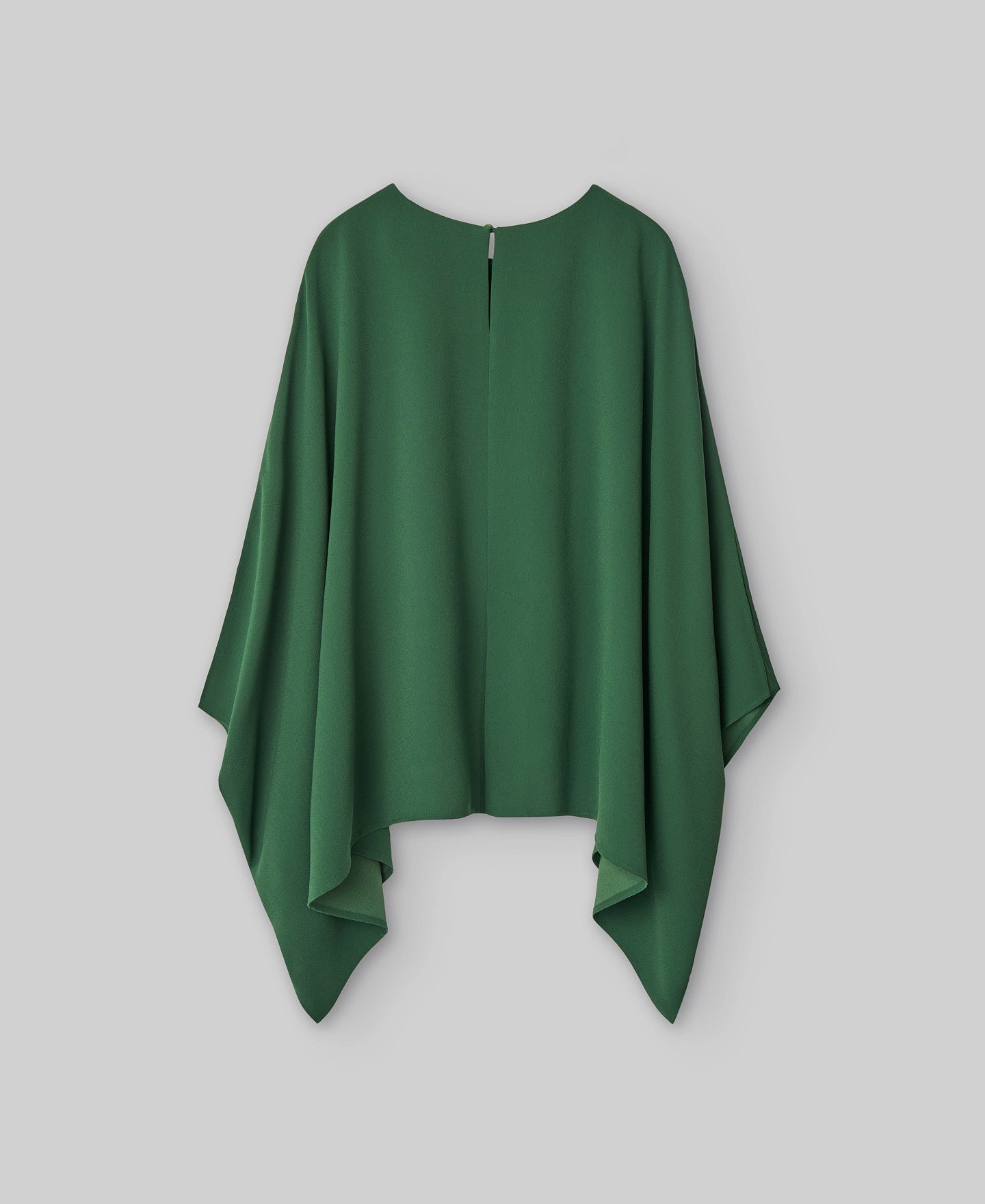 Wide green top woman in green