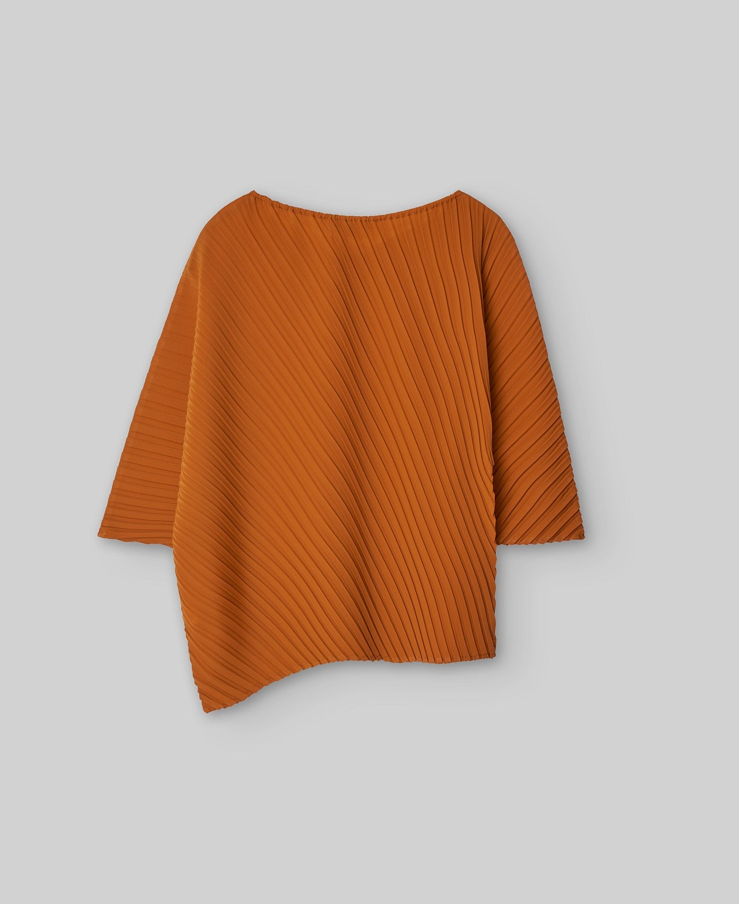 Asymmetrical crinkle top woman in orange