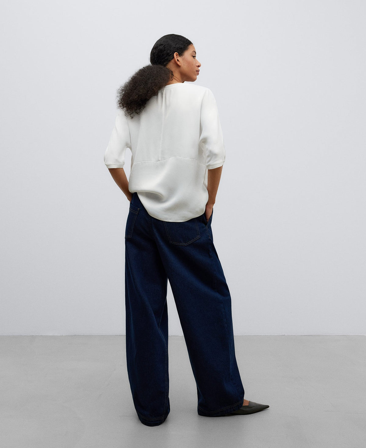 White Fluid V-Neck Blouse