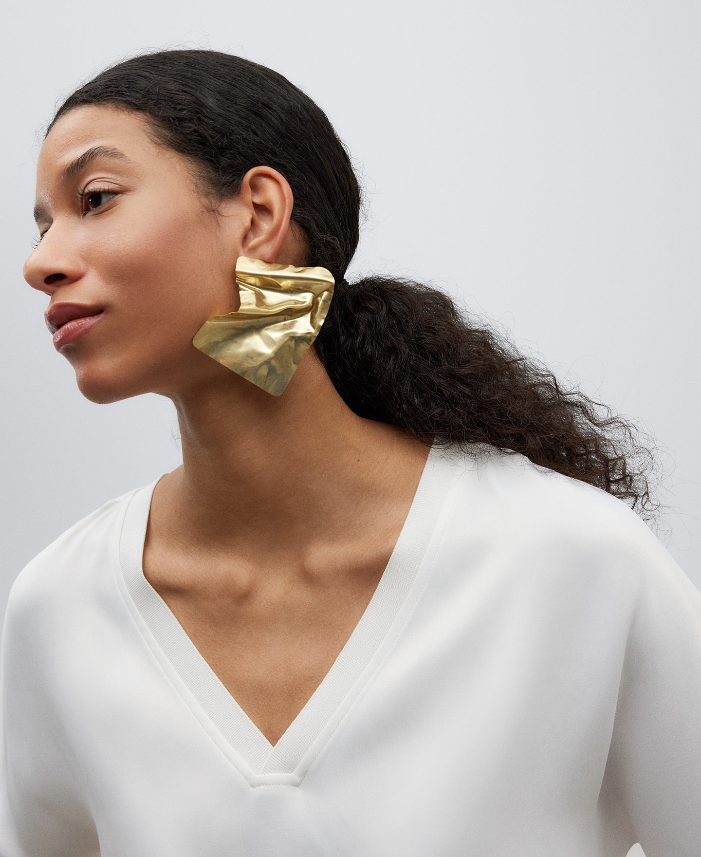 White Fluid V-Neck Blouse