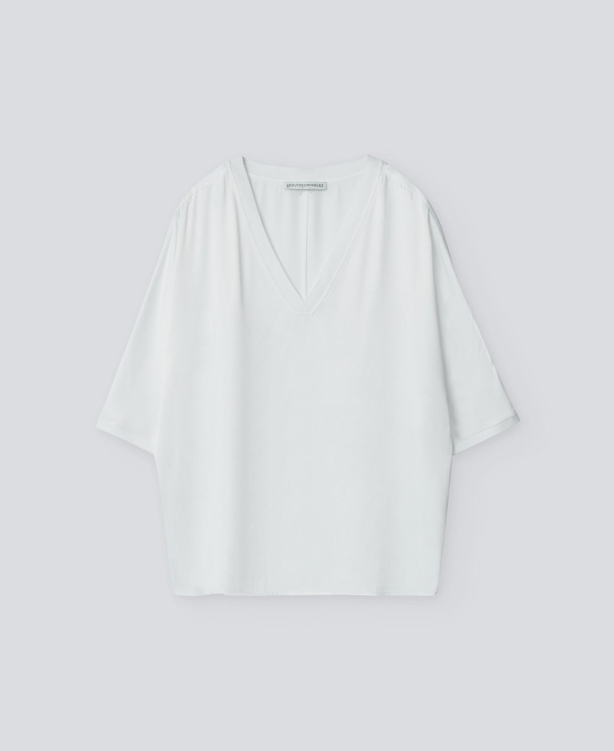 White Fluid V-Neck Blouse
