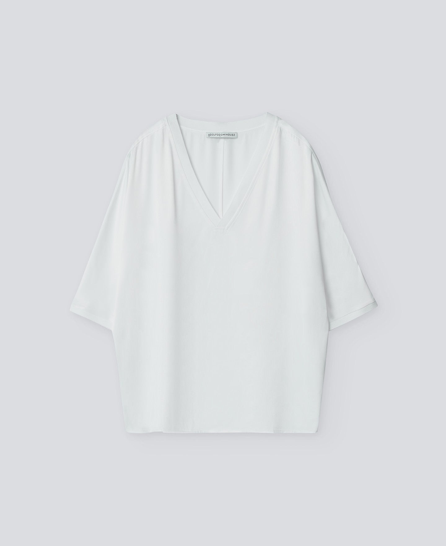 White Fluid V-Neck Blouse