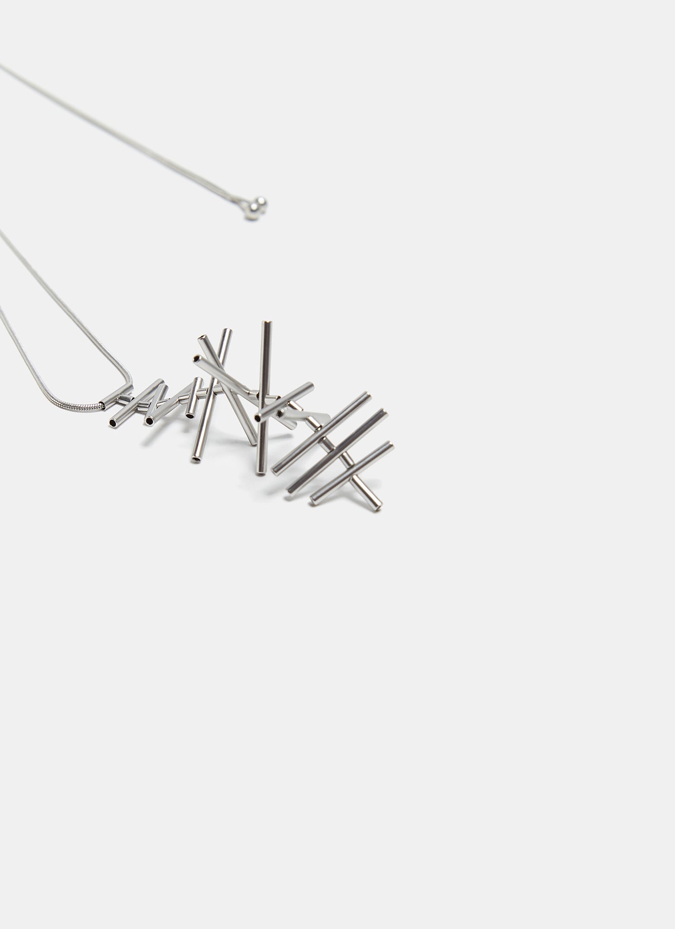 Silver Metal Necklace With Tubular Shapes