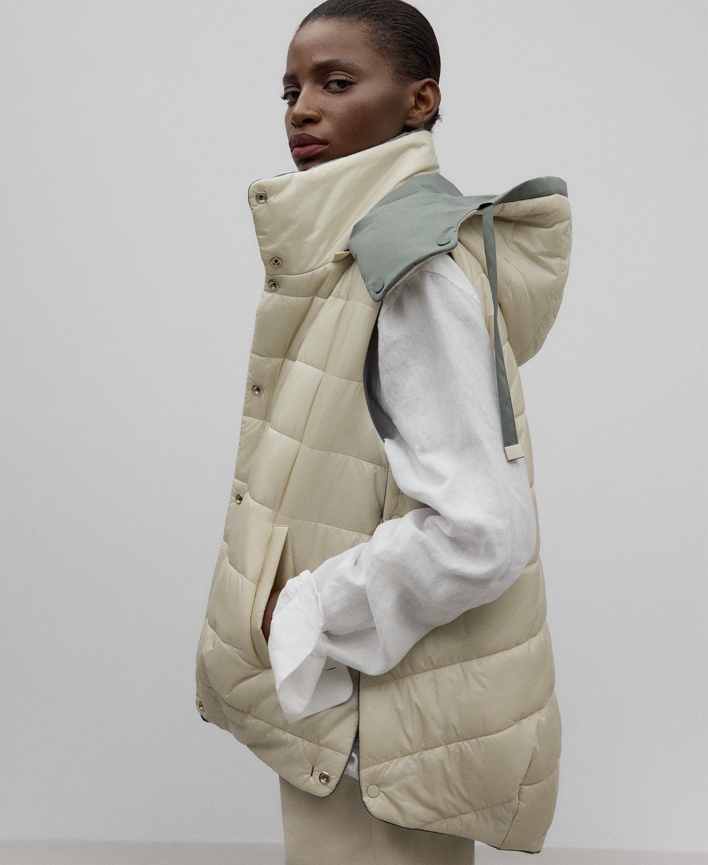 Reversible hooded vest woman in multicolor2