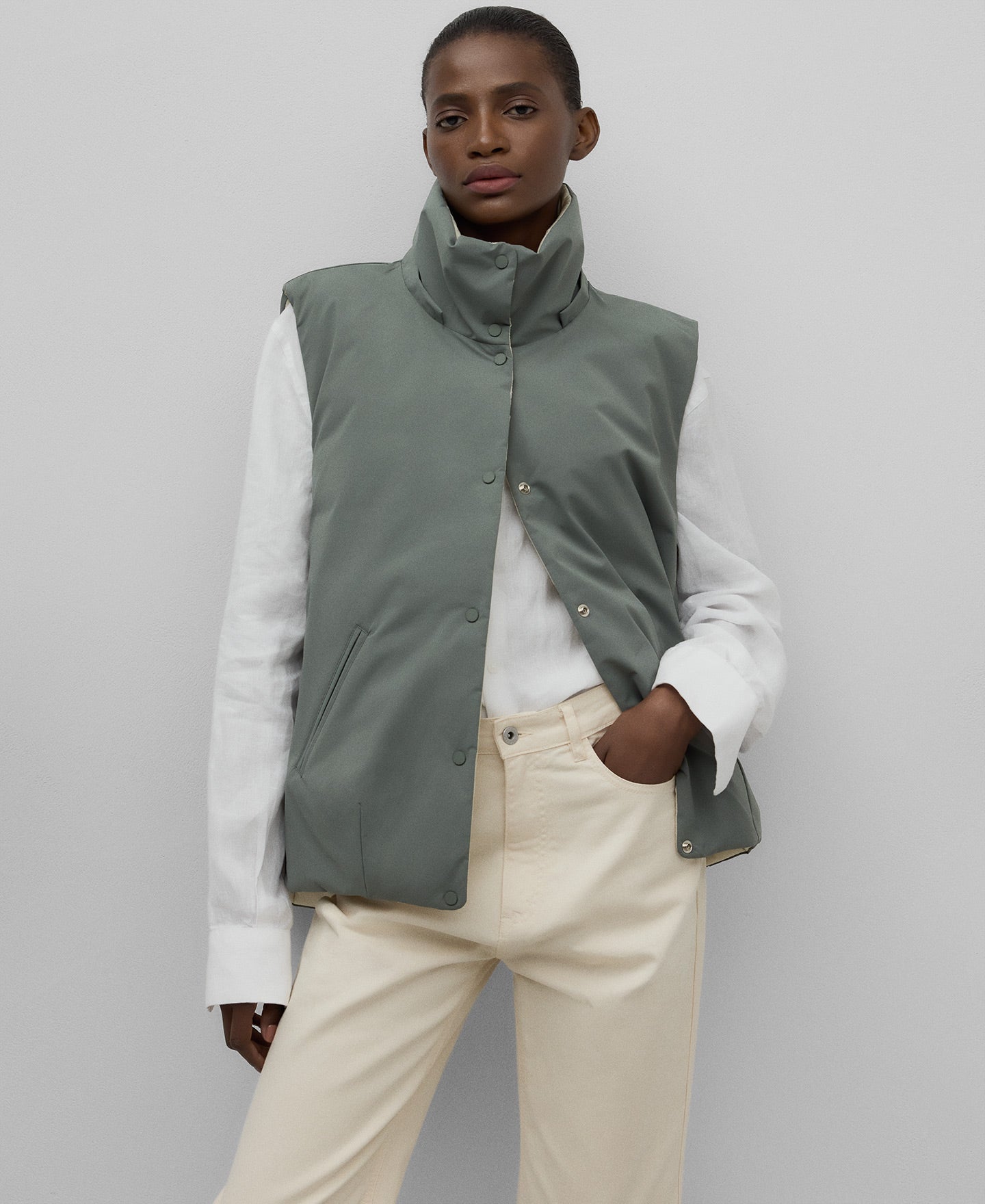 Reversible hooded vest woman in multicolor2