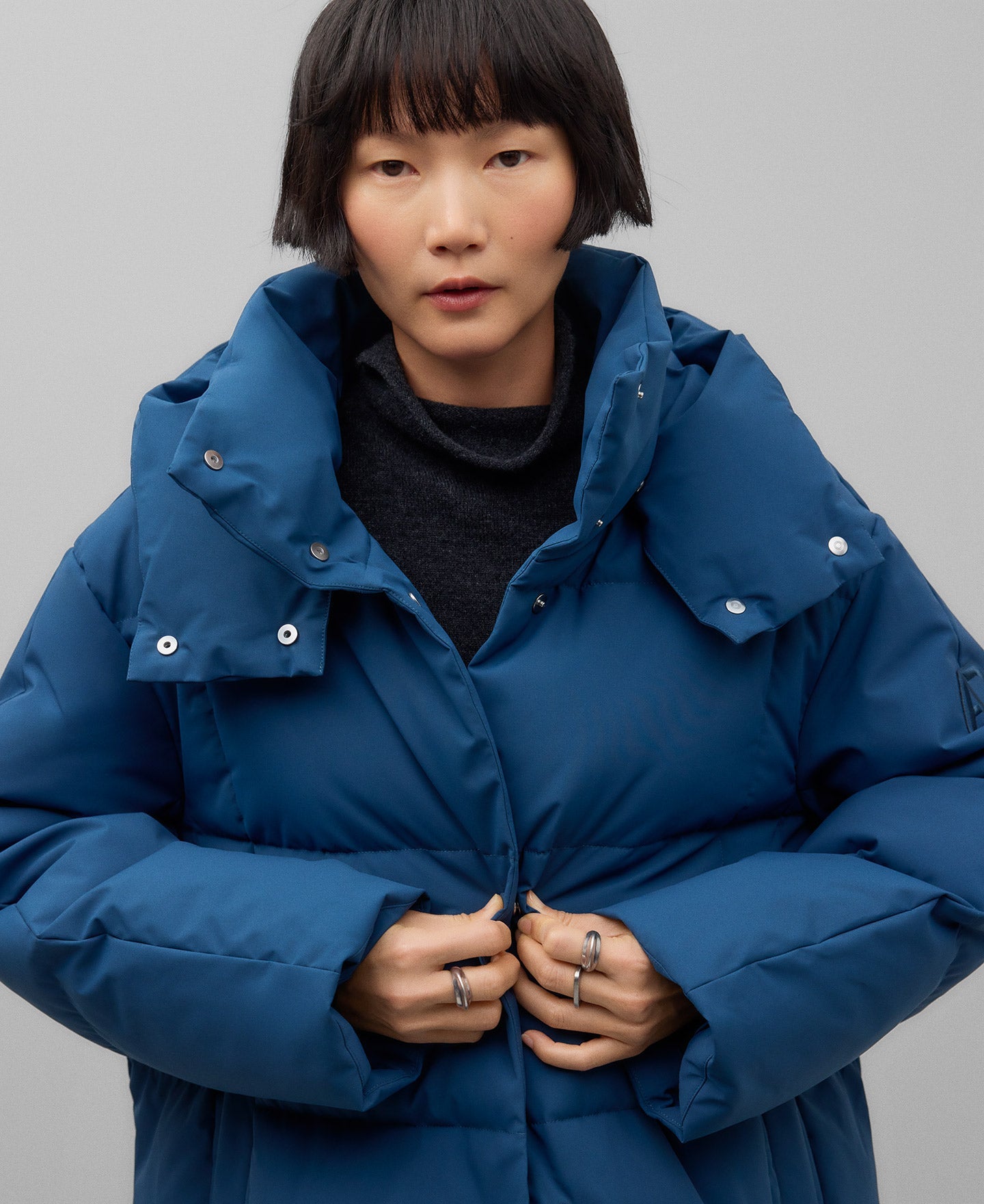 Long quilted jacket with hood woman in blue/green