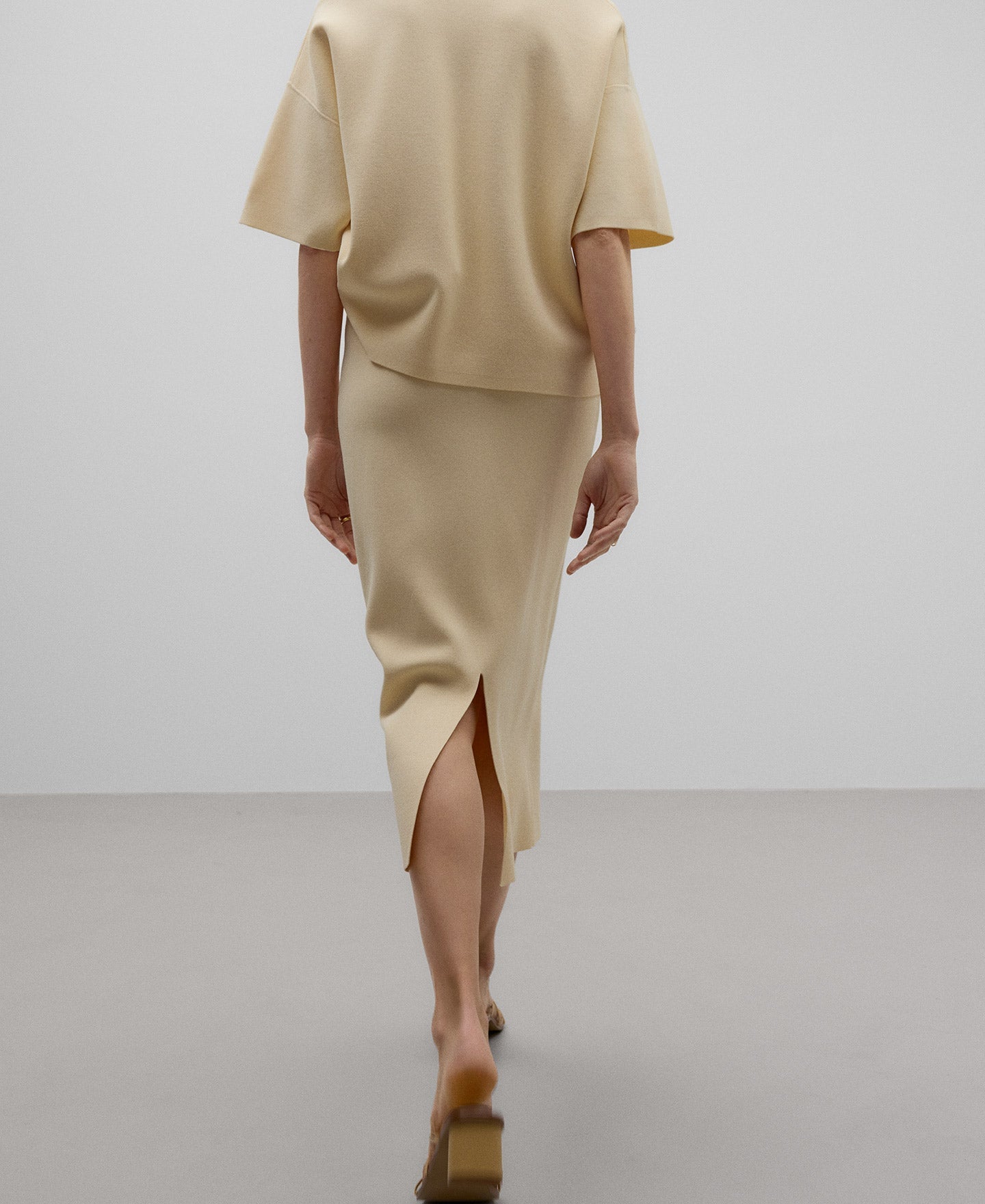 Ecru knit skirt woman in light cream