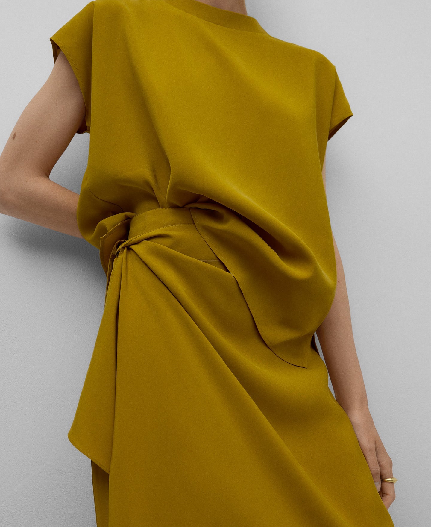 Draped skirt with knot woman in yellow turmeric