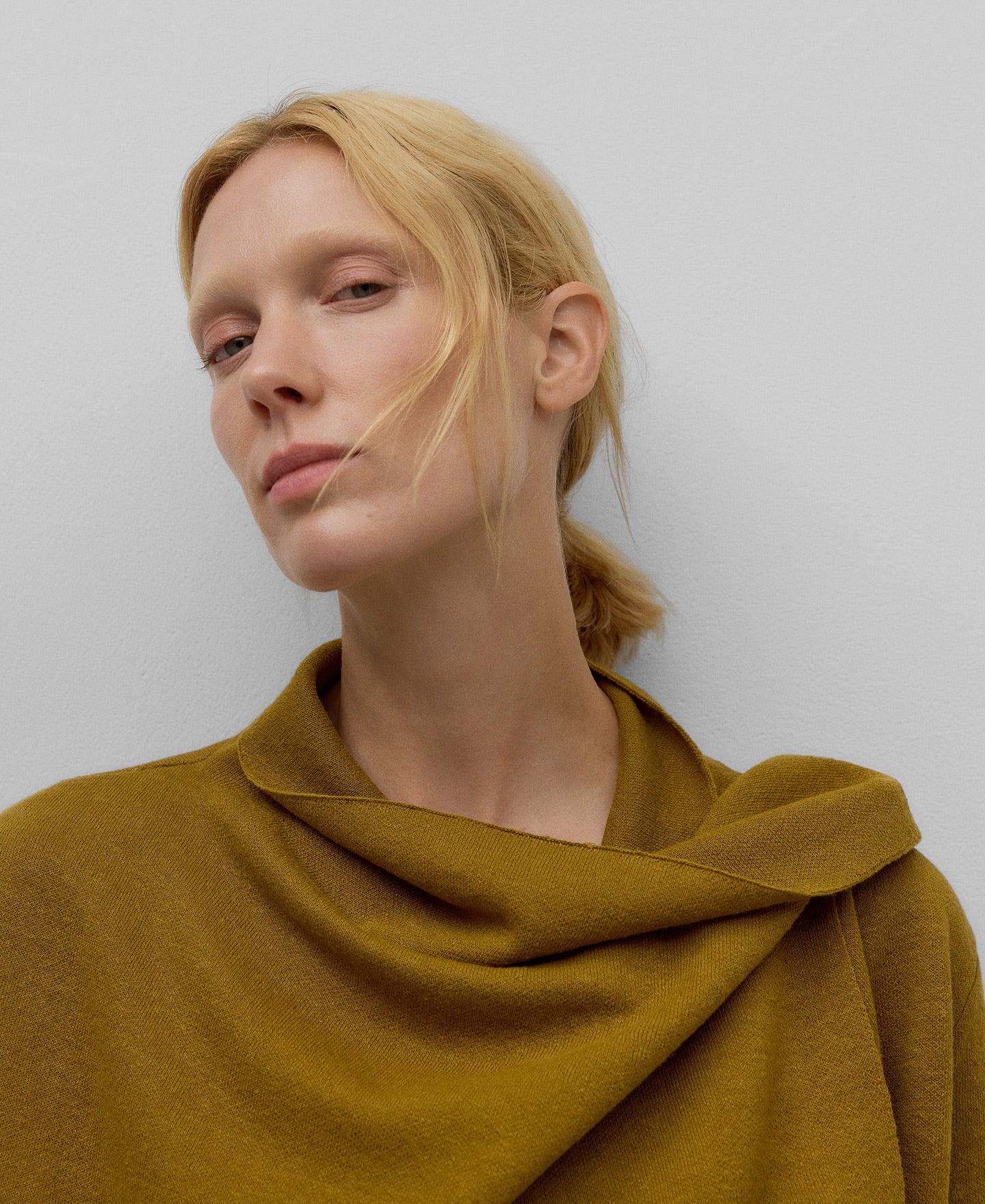 Knit asymmetrical jacket woman in olive green
