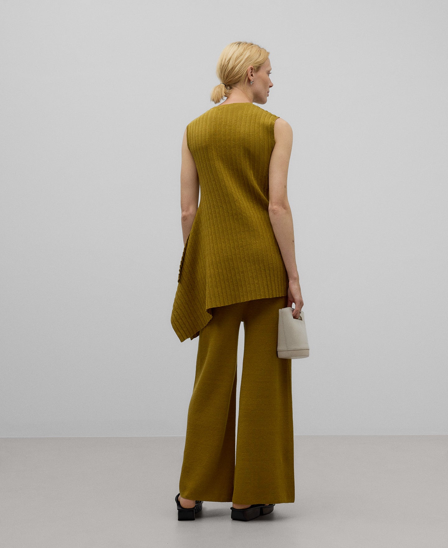 Asymmetrical pleated linen top woman in green
