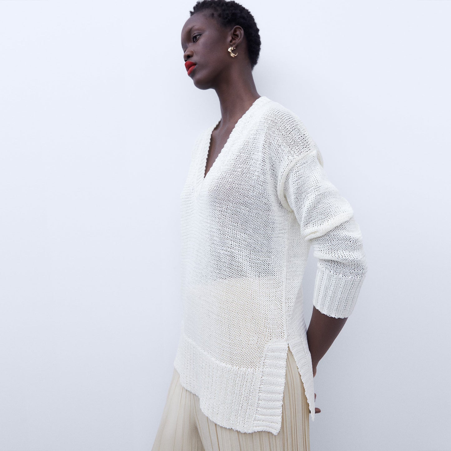 Beige V-neck wide fit sweater