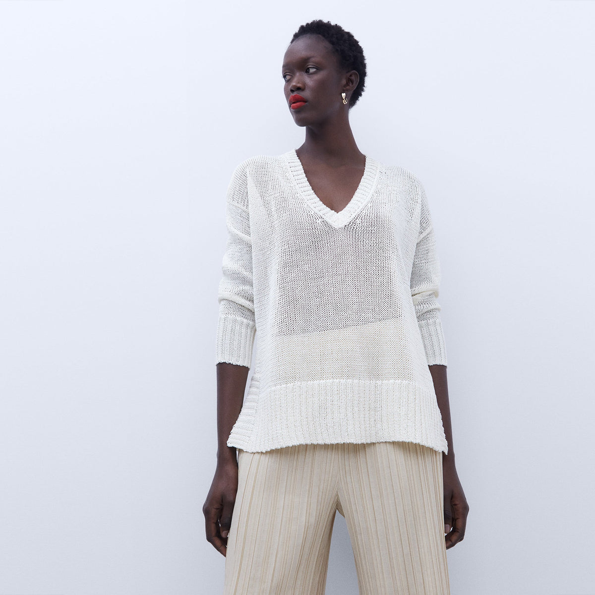 Beige V-neck wide fit sweater