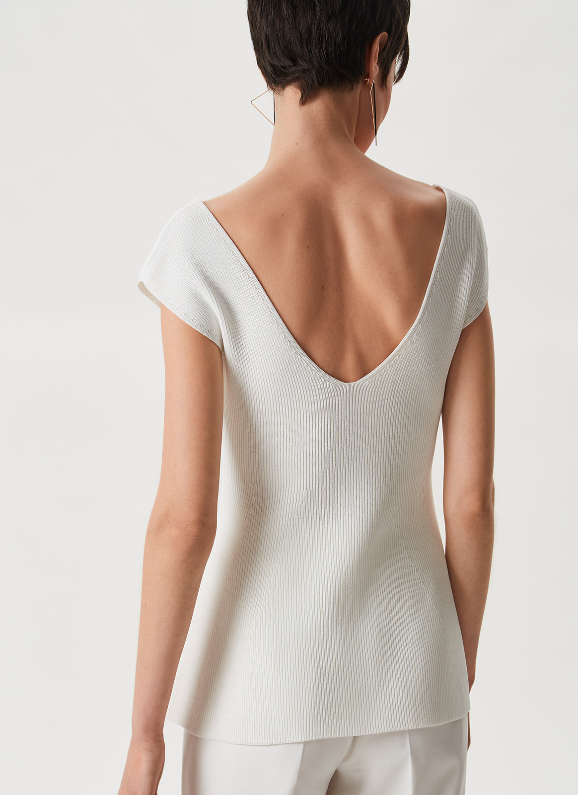 Ecru Knit Peplum Top With Open Back