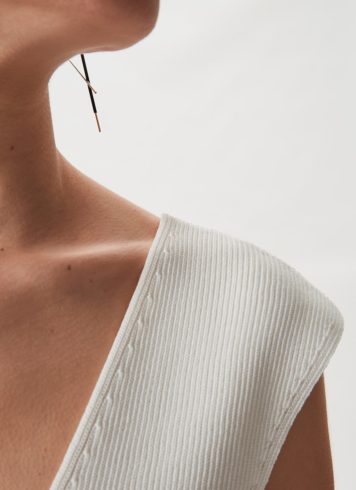 Ecru Knit Peplum Top With Open Back