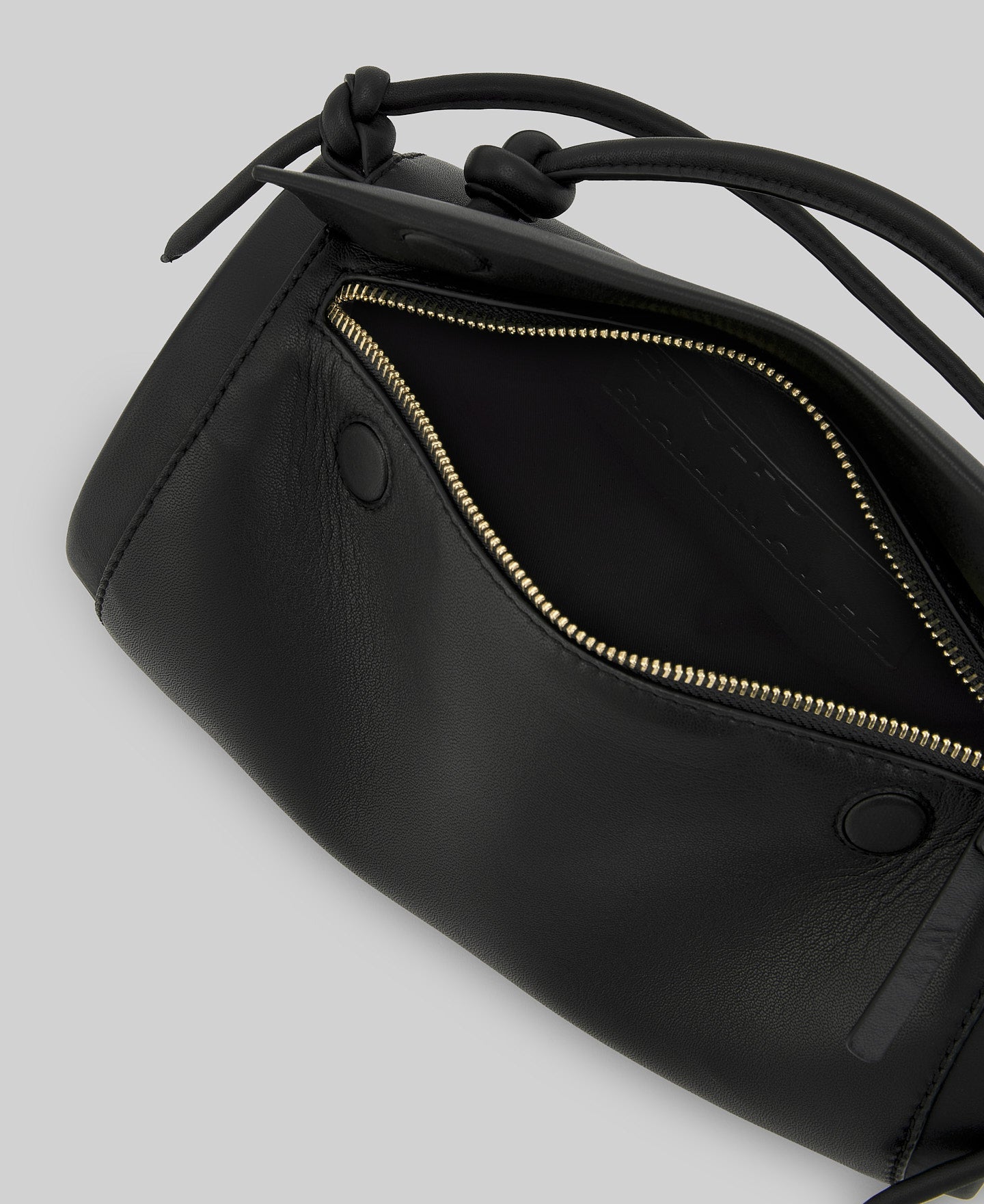 Black cylindrical leather bag woman in black