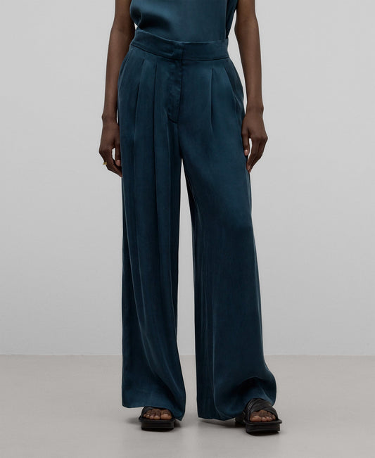 Blue pleated trousers woman in petrol blue