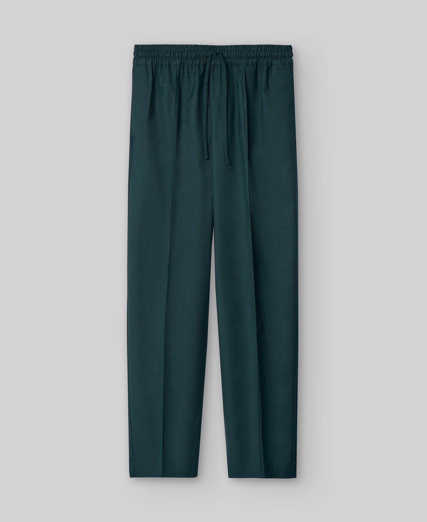Green jogger trousers woman in dark green