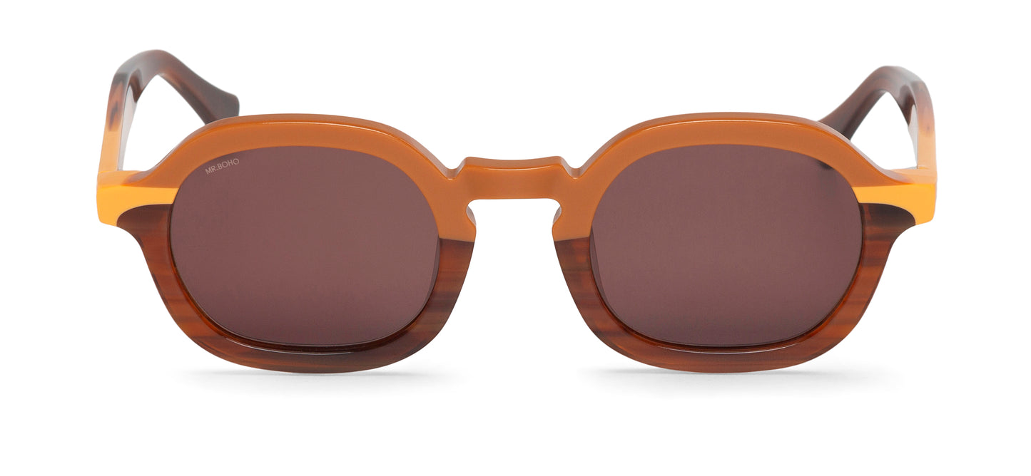 A pair of brown-framed oval sunglasses with dark lenses.