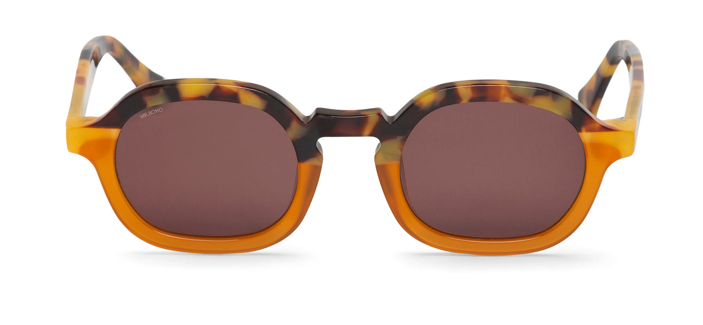 A pair of orange and tortoiseshell pattern-framed oval sunglasses with dark lenses.