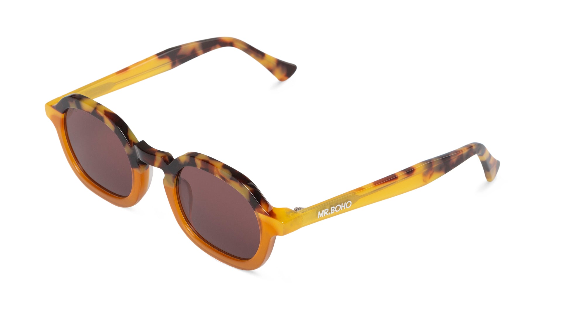 A pair of orange and tortoiseshell pattern-framed oval sunglasses with dark lenses.-arial view