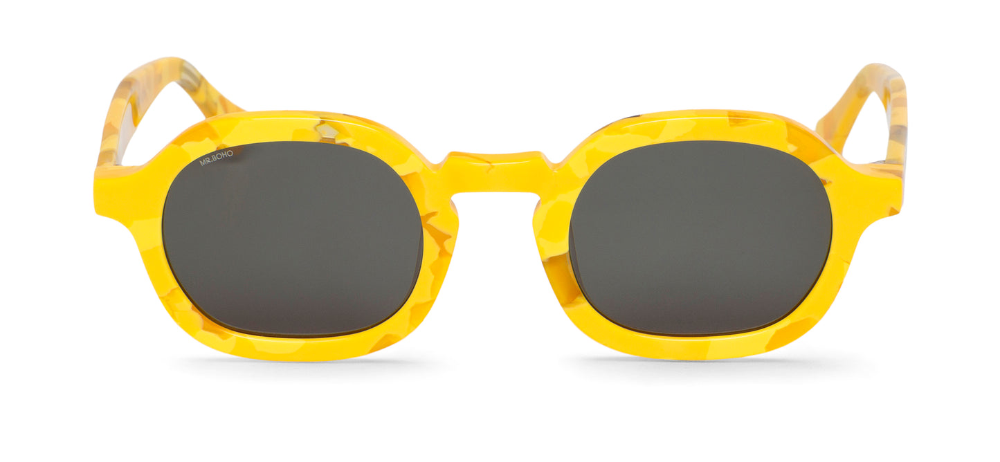 A pair of yellow-framed oval sunglasses with dark lenses.